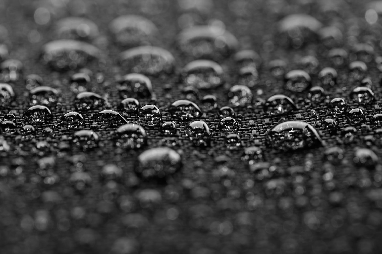 Waterproof textile after rain – covered with water drops