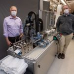 A Boston University-Fraunhofer collaboration has produced a new machine, able to produce 2,000 three-piece polypropylene facemasks an hour, and which is described as resembling an  old-fashioned printing press crossed with an assembly line.