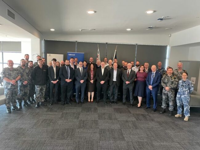 Babcock Australasia staff and stakeholders at an opening event celebrating beginning the operation of the critical JP9101 Comms system.