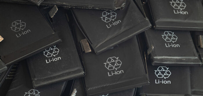 Close up of old used lithium polymer batteries of mobile phones preparation for recycling.