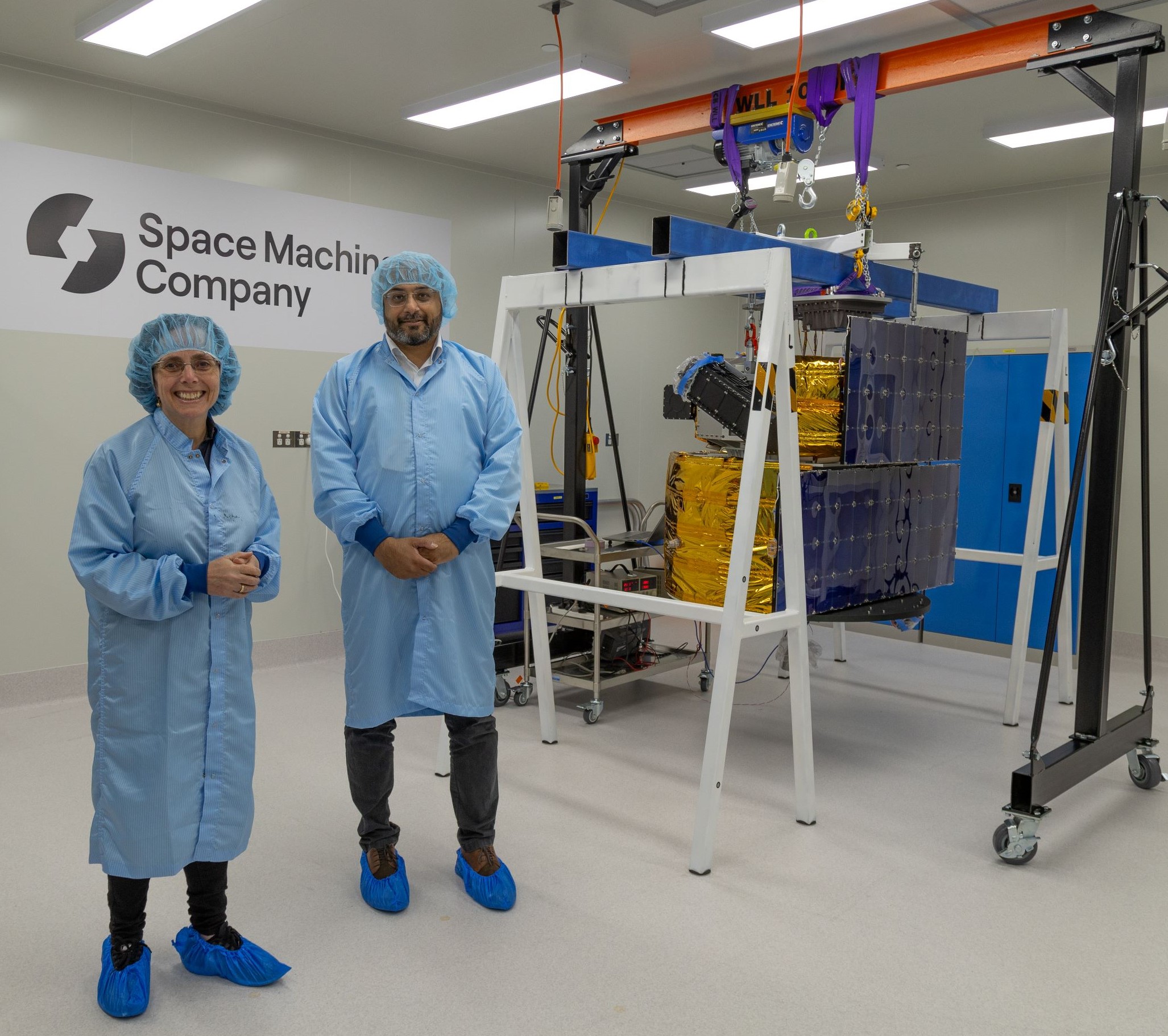 Samantha and Rajat next to Optimus build